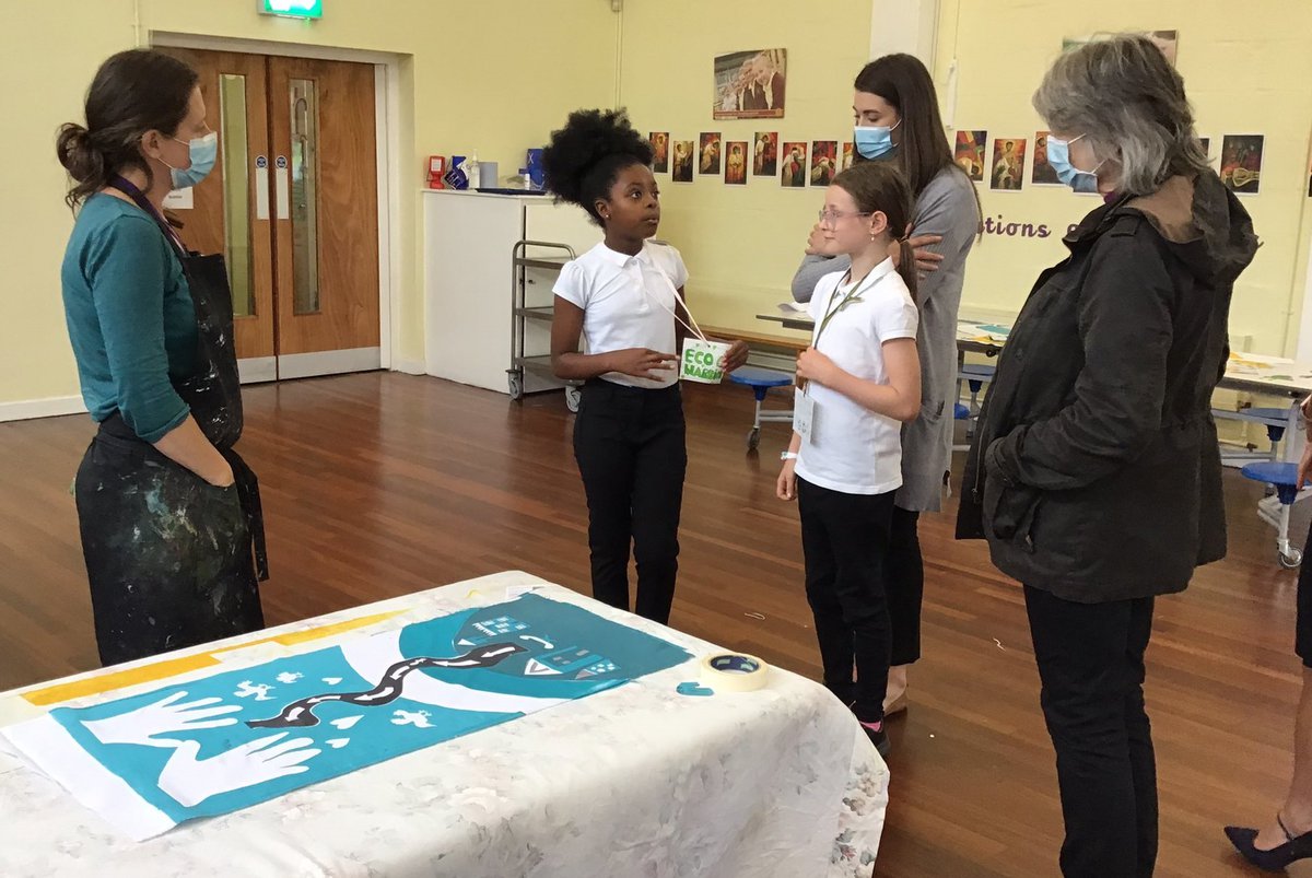 Bishop Cherry talks to children about art project